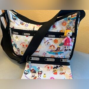 LeSportsac Disney It’s a Small World “Around the World” Hobo w/doll & pouch